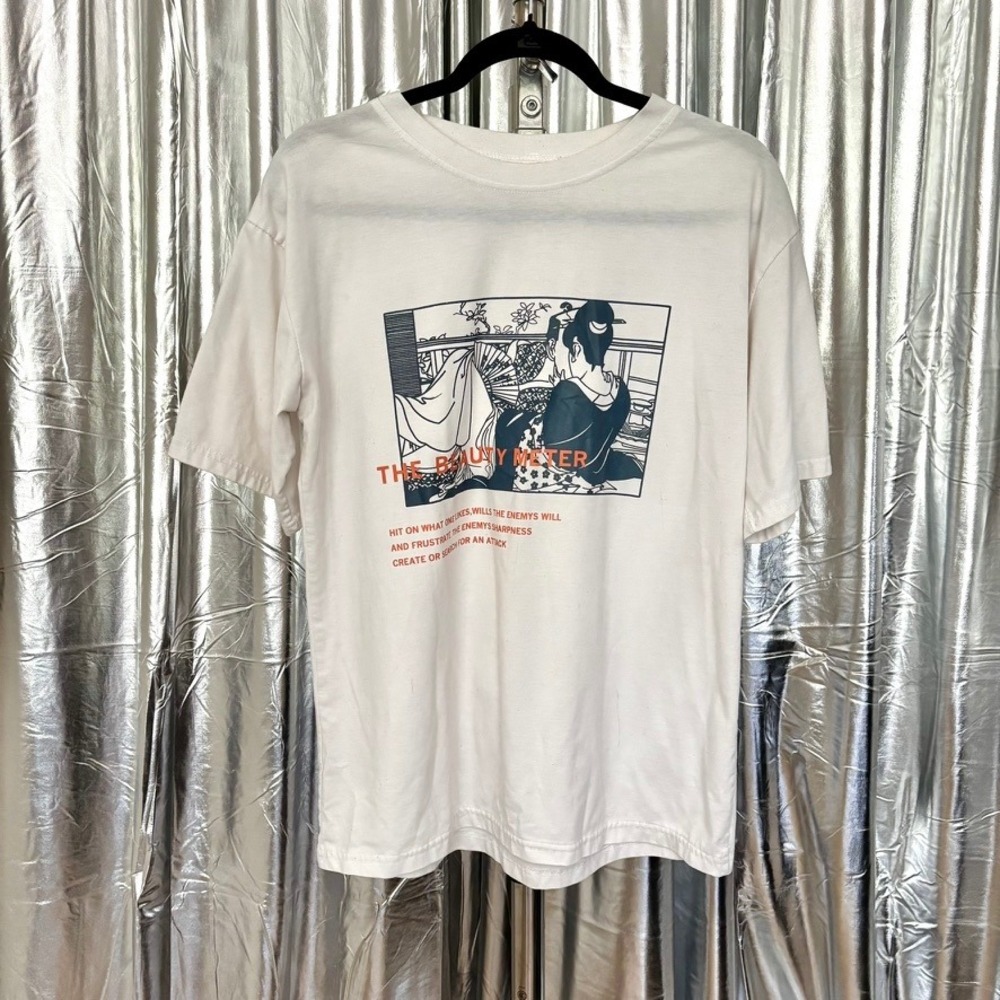 "The Beauty Meter" White Graphic T-Shirt